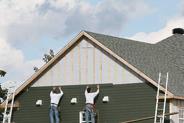 Professional Vinyl Siding technician working in Beverly, MA